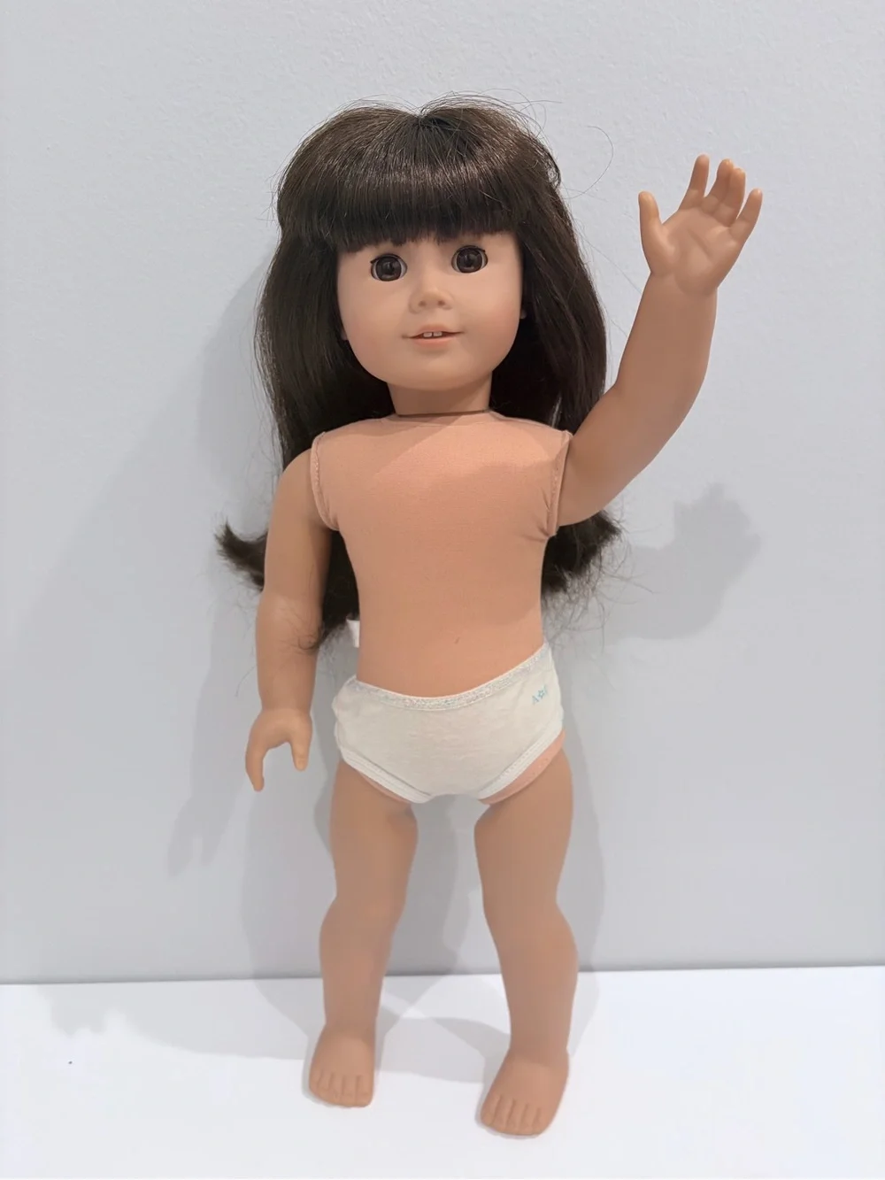 American Girl Brown-Haired Doll with Peach Bodysuit and White Undergarment
